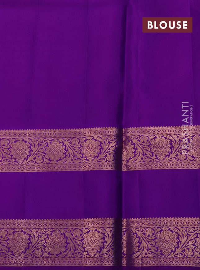 Pure kanchipuram silk saree dual shade of blue and purple with allover zari woven brocade weaves and rettapet copper zari woven border