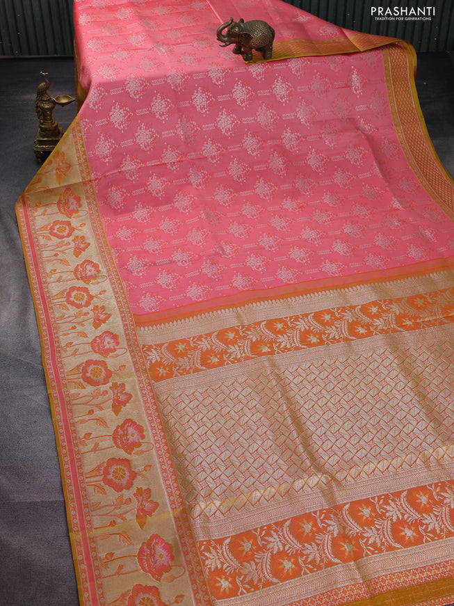 Pure kanchipuram silk saree peach shade and mustard yellow with allover silver zari woven brocade weaves and rich zari woven floral design border