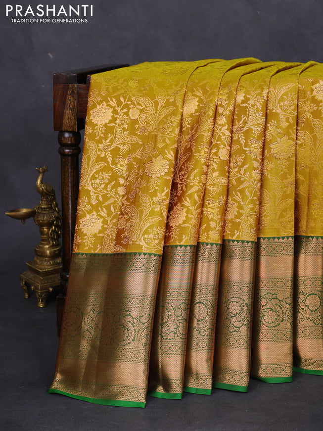 Pure kanchipuram silk saree mustard yellow and green with allover zari woven floral brocade weaves and long rich zari woven border