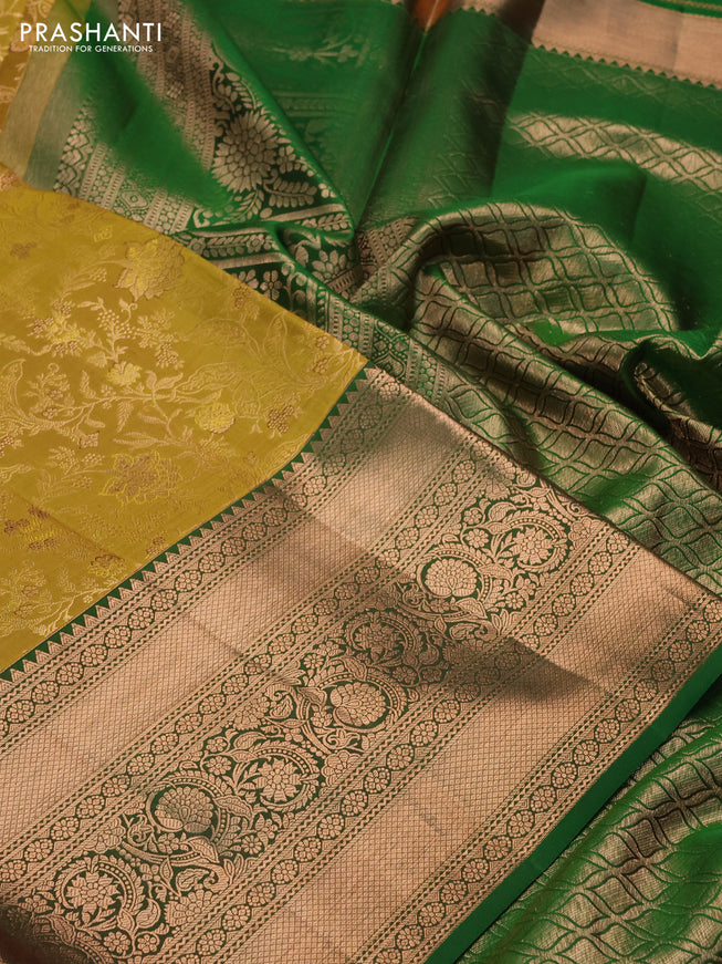 Pure kanchipuram silk saree mustard yellow and green with allover zari woven floral brocade weaves and long rich zari woven border