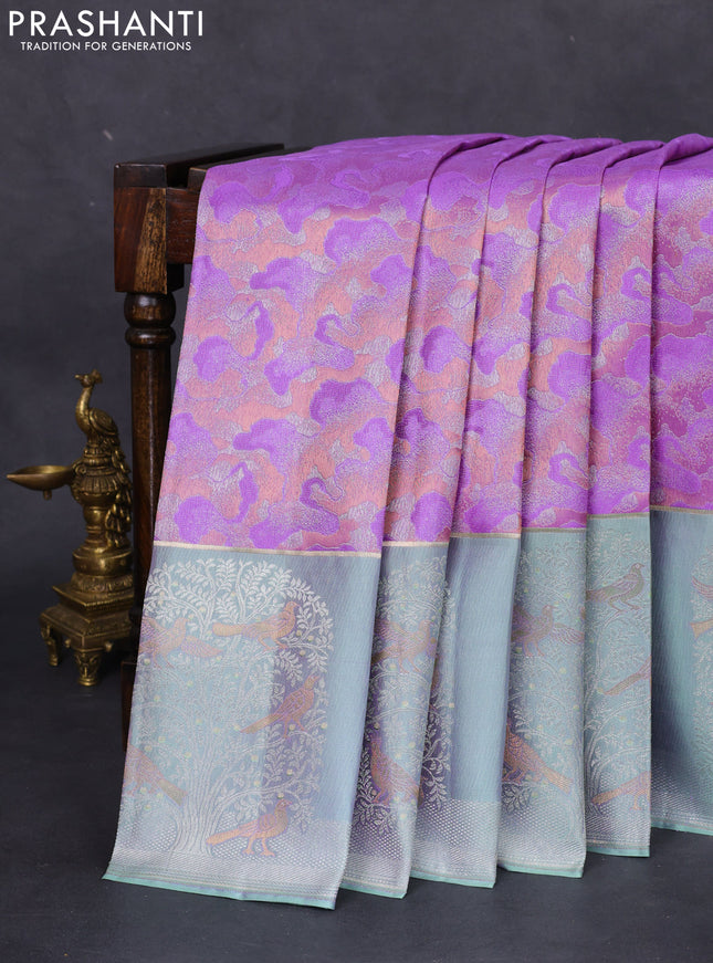 Pure kanchipuram silk saree lavender and pastel green with allover silver & copper zari woven brocade weaves and long silver zari woven bird butta border