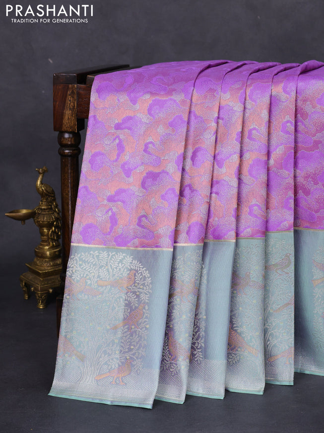 Pure kanchipuram silk saree lavender and pastel green with allover silver & copper zari woven brocade weaves and long silver zari woven bird butta border