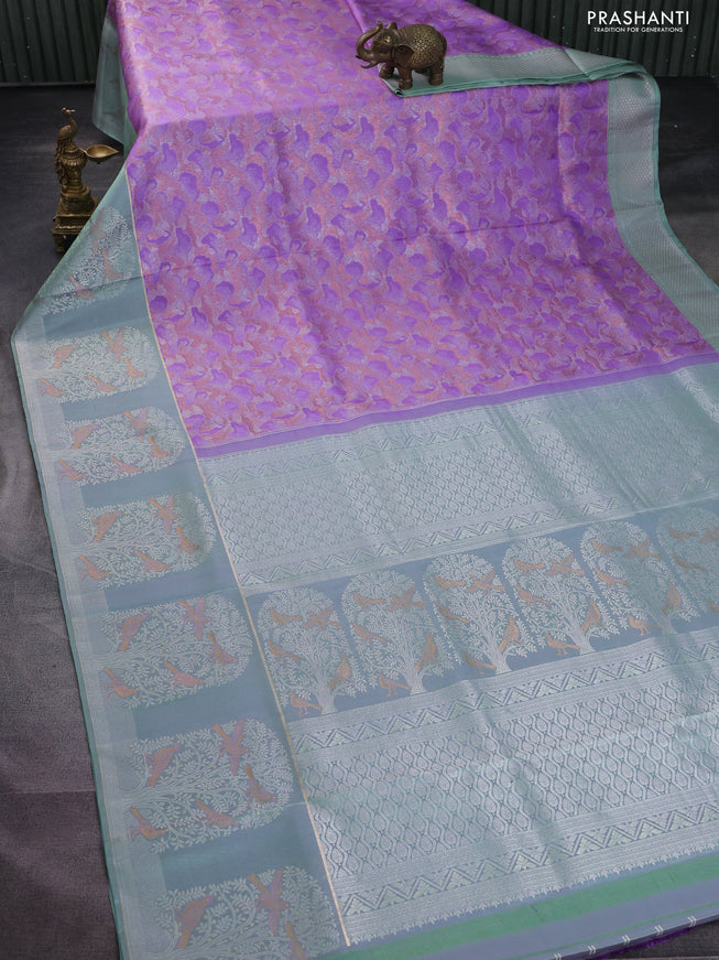 Pure kanchipuram silk saree lavender and pastel green with allover silver & copper zari woven brocade weaves and long silver zari woven bird butta border
