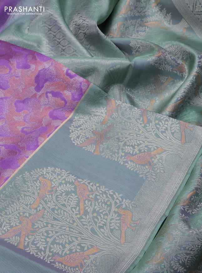 Pure kanchipuram silk saree lavender and pastel green with allover silver & copper zari woven brocade weaves and long silver zari woven bird butta border