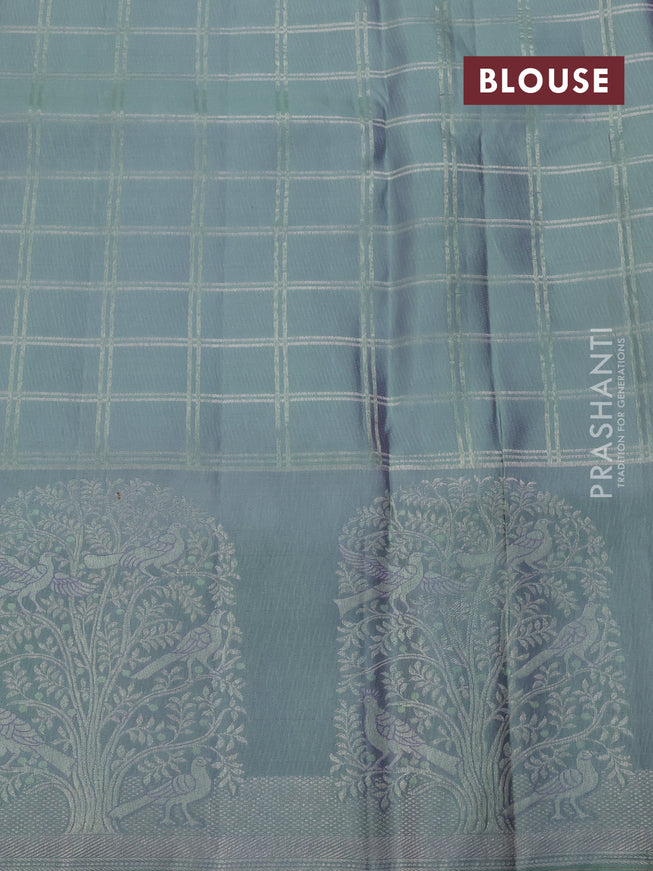 Pure kanchipuram silk saree lavender and pastel green with allover silver & copper zari woven brocade weaves and long silver zari woven bird butta border
