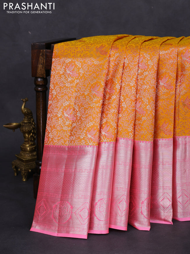 Pure kanchipuram silk saree mango yellow and light pink with allover silver zari woven brocade weaves and long silver zari woven border