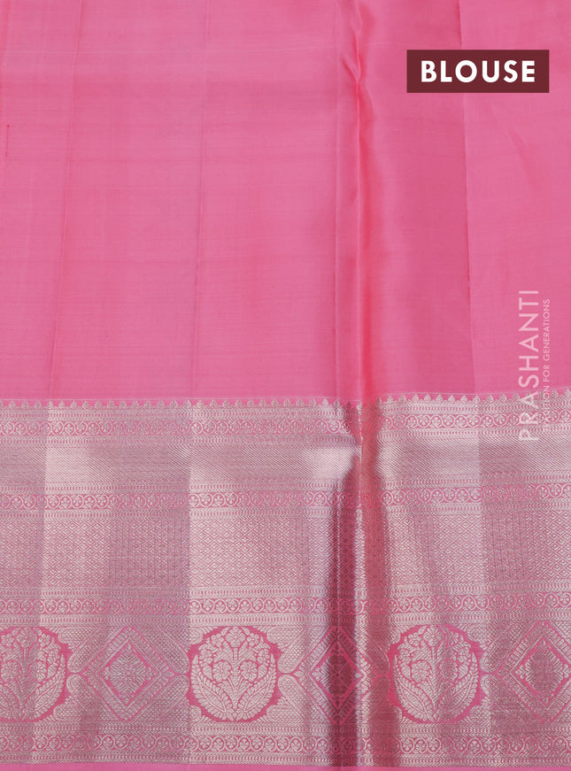 Pure kanchipuram silk saree mango yellow and light pink with allover silver zari woven brocade weaves and long silver zari woven border