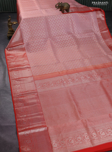 Pure kanchipuram silk saree peach shade and orange with allover silver zari woven brocade weaves and long rich zari woven border