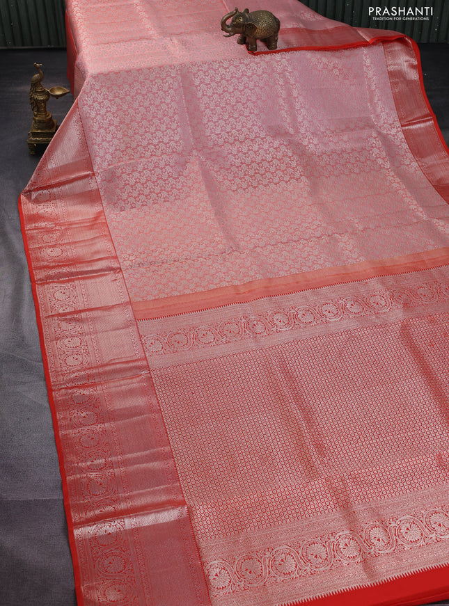 Pure kanchipuram silk saree peach shade and orange with allover silver zari woven brocade weaves and long rich zari woven border