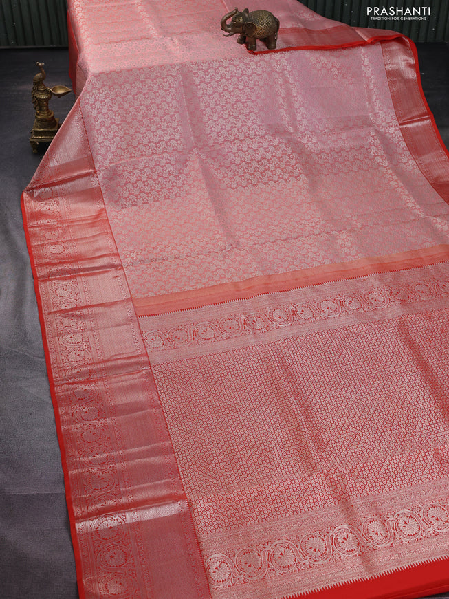 Pure kanchipuram silk saree peach shade and orange with allover silver zari woven brocade weaves and long rich zari woven border