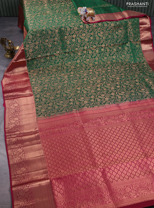 Pure kanchipuram silk saree green and magenta pink with allover zari woven brocade weaves and rich zari woven border