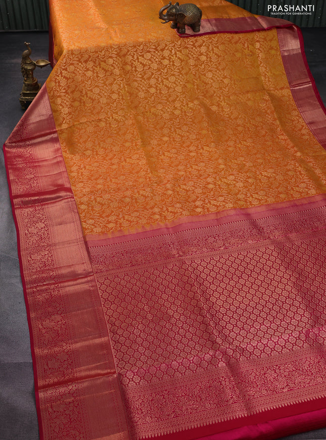 Pure kanchipuram silk saree mustard yellow and pink with allover zari woven floral brocade weaves and long rich zari woven border