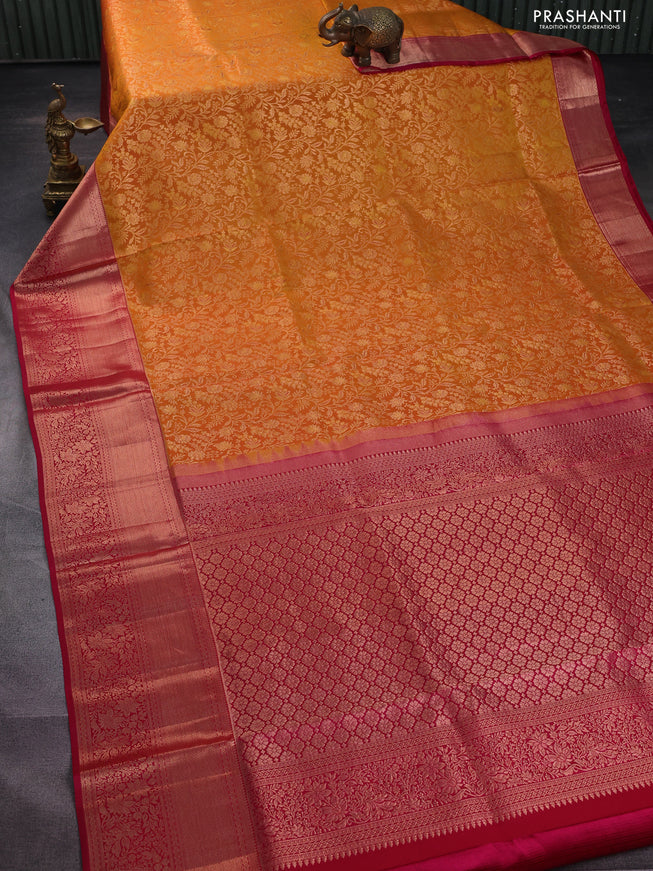 Pure kanchipuram silk saree mustard yellow and pink with allover zari woven floral brocade weaves and long rich zari woven border
