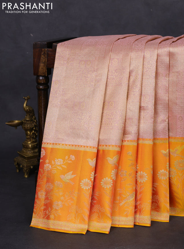Pure kanchipuram silk saree mild peach and mustard yellow with allover zari woven brocade weaves and rich zari woven border