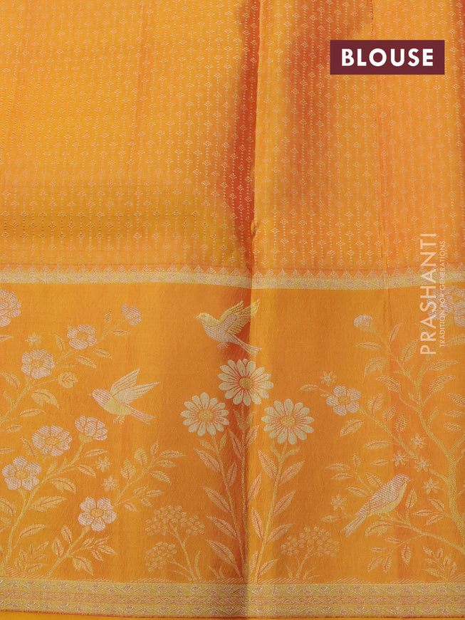 Pure kanchipuram silk saree mild peach and mustard yellow with allover zari woven brocade weaves and rich zari woven border
