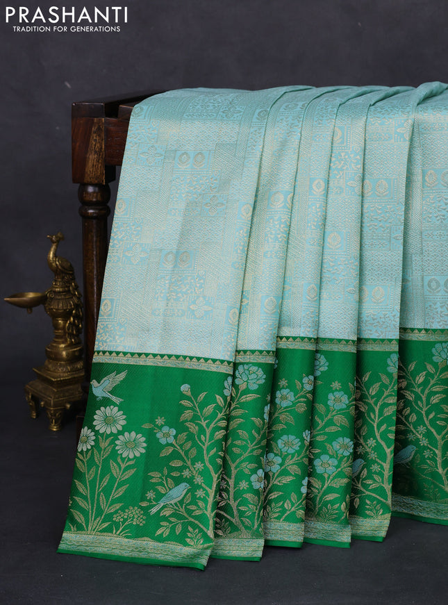 Pure kanchipuram silk saree teal blue and green with allover zari woven brocade weaves and rich zari woven border