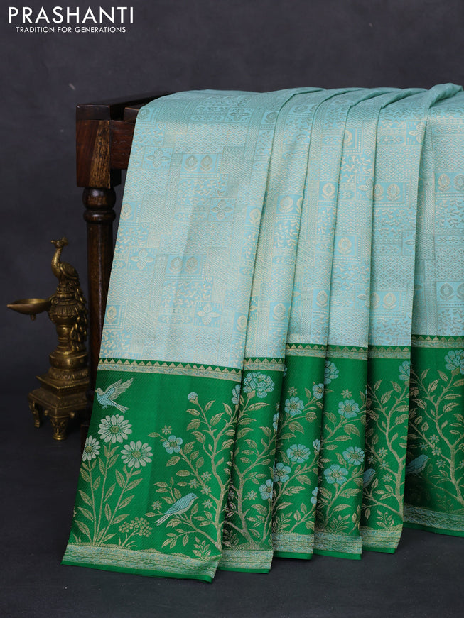 Pure kanchipuram silk saree teal blue and green with allover zari woven brocade weaves and rich zari woven border