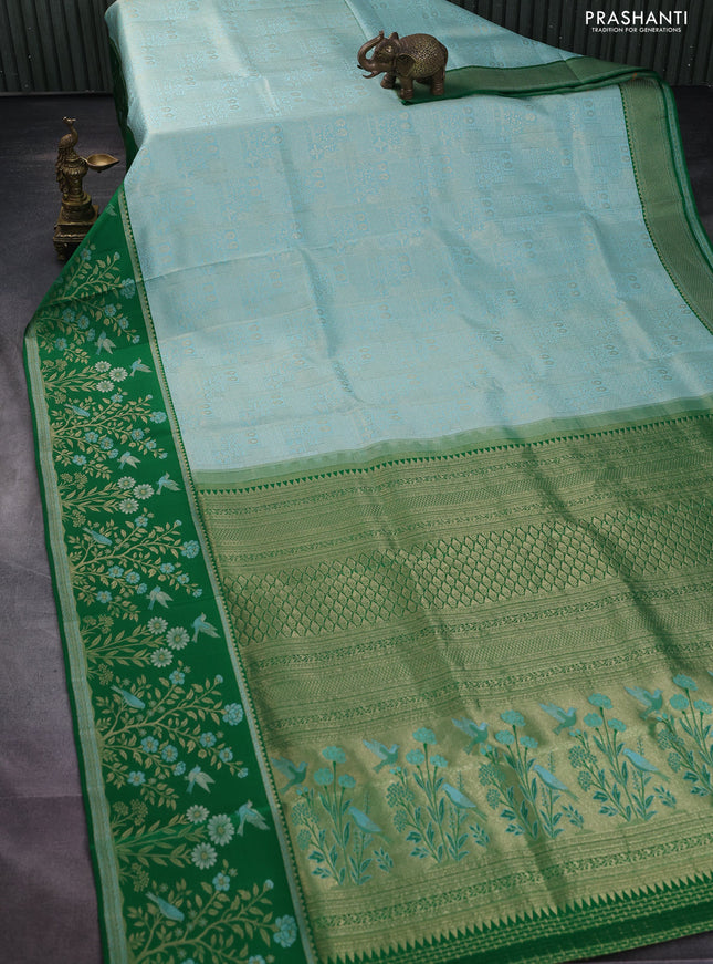 Pure kanchipuram silk saree teal blue and green with allover zari woven brocade weaves and rich zari woven border