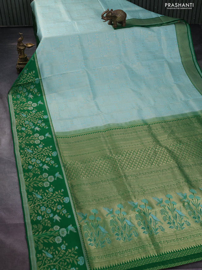 Pure kanchipuram silk saree teal blue and green with allover zari woven brocade weaves and rich zari woven border
