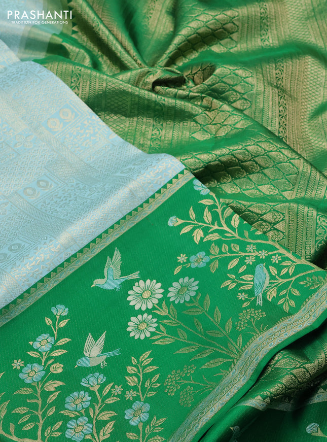 Pure kanchipuram silk saree teal blue and green with allover zari woven brocade weaves and rich zari woven border