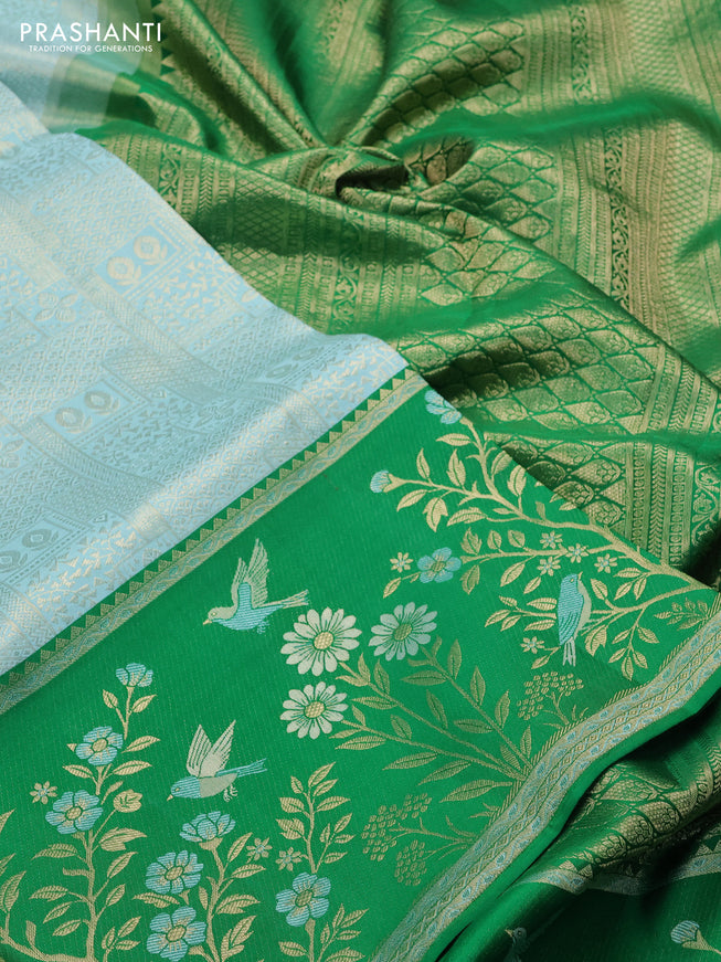 Pure kanchipuram silk saree teal blue and green with allover zari woven brocade weaves and rich zari woven border