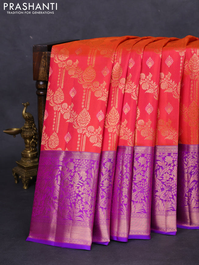Pure kanchipuram silk saree dual shade of pinkish orange and purple with allover zari woven brocade weaves and rich zari woven border