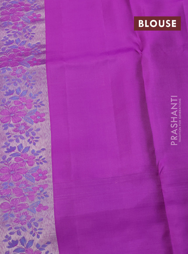 Pure kanchipuram silk saree light blue and purple with allover silver zari woven brocade weaves and zari woven floral design border
