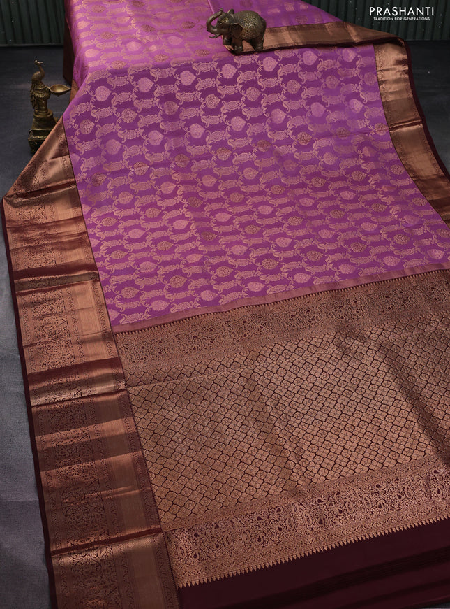 Pure kanchipuram silk saree mauve pink and deep maroon with allover zari woven brocade weaves and zari woven border