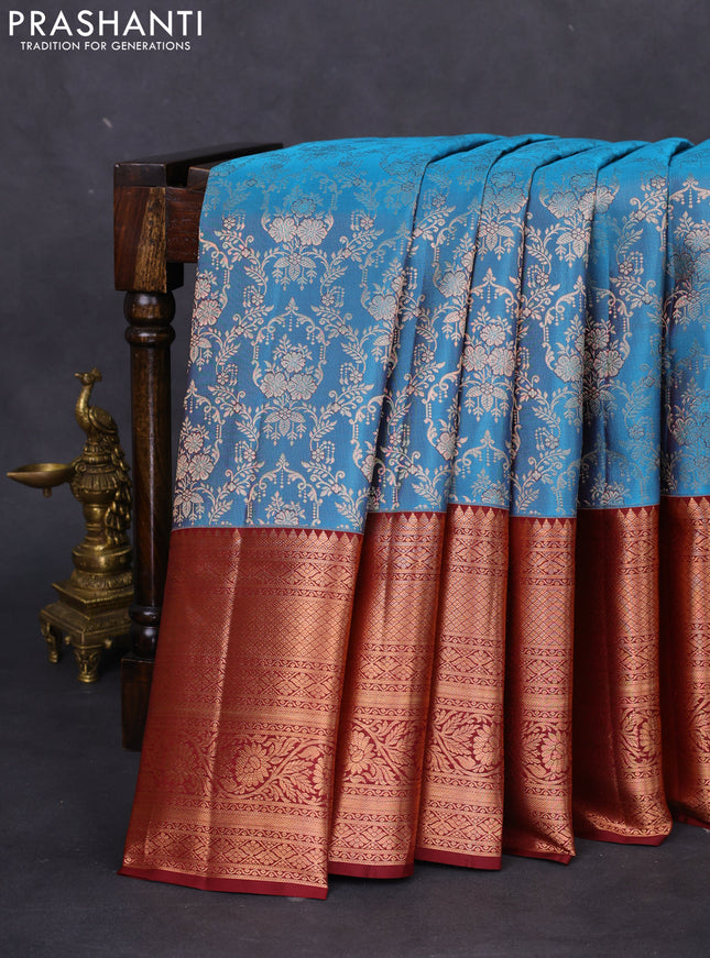 Pure kanchipuram silk saree cs blue and deep maroon with allover zari woven brocade weaves and long copper zari woven border