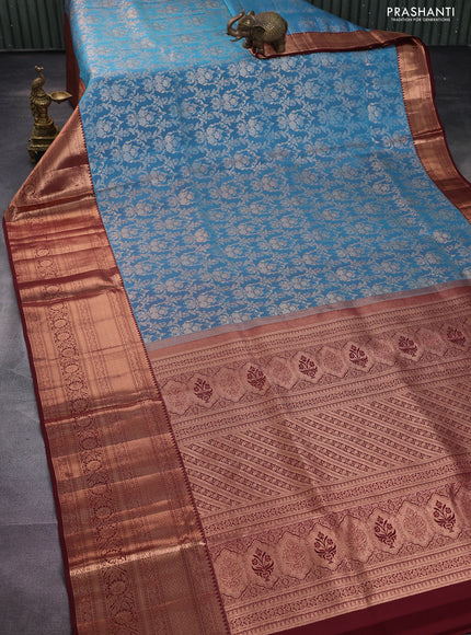 Pure kanchipuram silk saree cs blue and deep maroon with allover zari woven brocade weaves and long copper zari woven border
