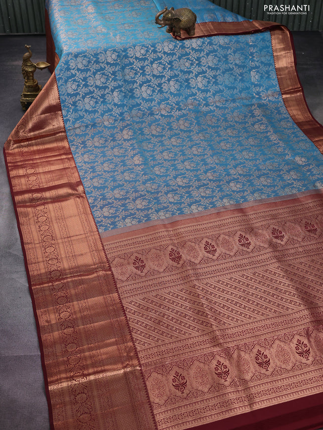 Pure kanchipuram silk saree cs blue and deep maroon with allover zari woven brocade weaves and long copper zari woven border