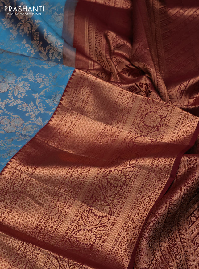 Pure kanchipuram silk saree cs blue and deep maroon with allover zari woven brocade weaves and long copper zari woven border