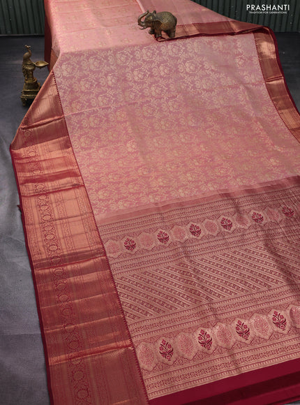 Pure kanchipuram silk saree peach shade and deep maroon with allover zari woven brocade weaves and long copper zari woven border