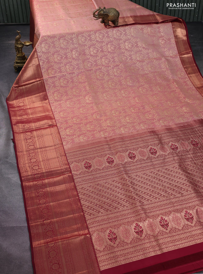 Pure kanchipuram silk saree peach shade and deep maroon with allover zari woven brocade weaves and long copper zari woven border