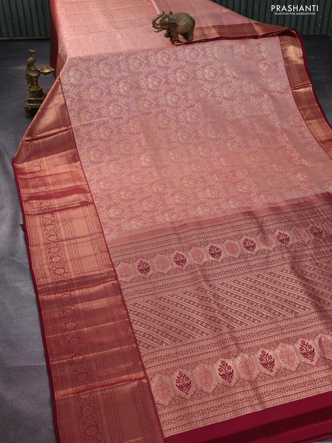 Pure kanchipuram silk saree peach shade and deep maroon with allover zari woven brocade weaves and long copper zari woven border