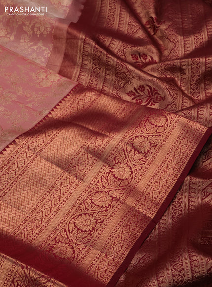 Pure kanchipuram silk saree peach shade and deep maroon with allover zari woven brocade weaves and long copper zari woven border