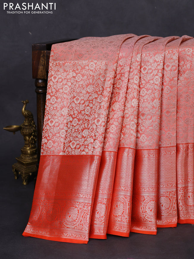 Pure kanchipuram silk saree peach shade and orange with allover silver zari woven brocade weaves and silver zari woven border