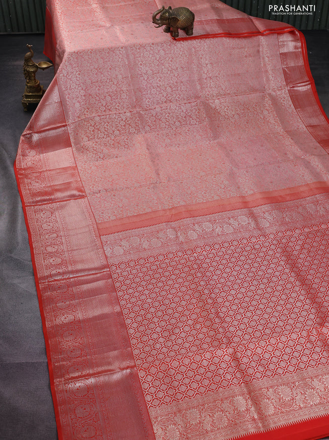 Pure kanchipuram silk saree peach shade and orange with allover silver zari woven brocade weaves and silver zari woven border