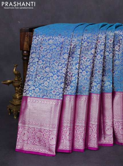 Pure kanchipuram silk saree dual shade of cs blue and purple with allover silver zari woven brocade weaves and silver zari woven border