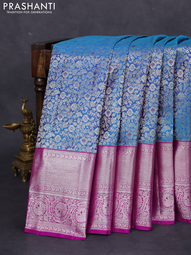 Pure kanchipuram silk saree dual shade of cs blue and purple with allover silver zari woven brocade weaves and silver zari woven border