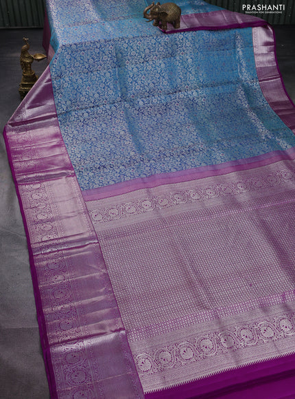 Pure kanchipuram silk saree dual shade of cs blue and purple with allover silver zari woven brocade weaves and silver zari woven border