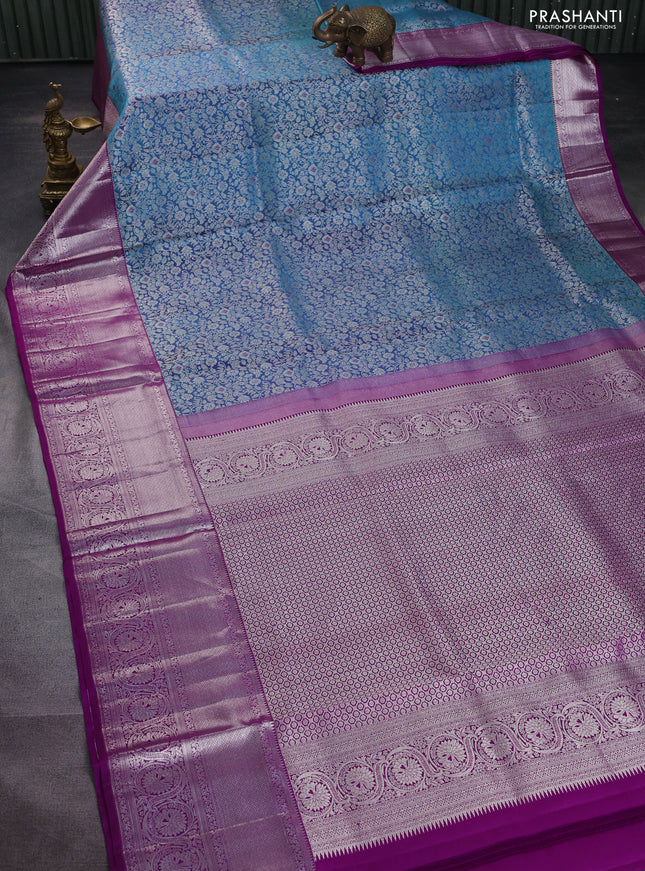 Pure kanchipuram silk saree dual shade of cs blue and purple with allover silver zari woven brocade weaves and silver zari woven border