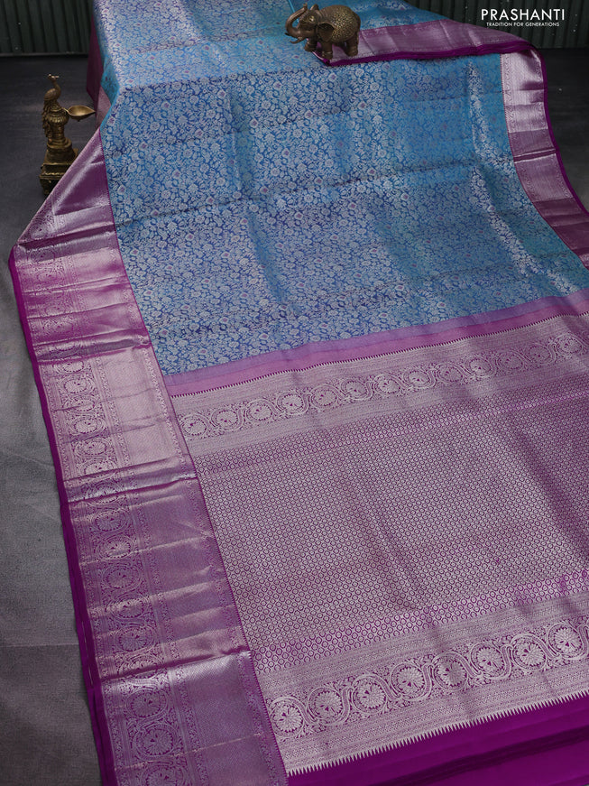 Pure kanchipuram silk saree dual shade of cs blue and purple with allover silver zari woven brocade weaves and silver zari woven border
