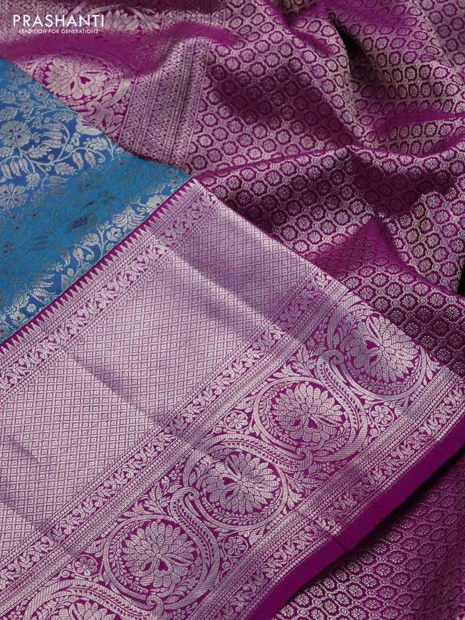 Pure kanchipuram silk saree dual shade of cs blue and purple with allover silver zari woven brocade weaves and silver zari woven border