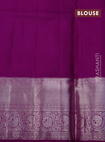 Pure kanchipuram silk saree dual shade of cs blue and purple with allover silver zari woven brocade weaves and silver zari woven border