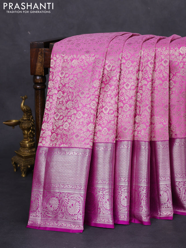 Pure kanchipuram silk saree lotus pink and purple with allover silver zari woven brocade weaves and silver zari woven border