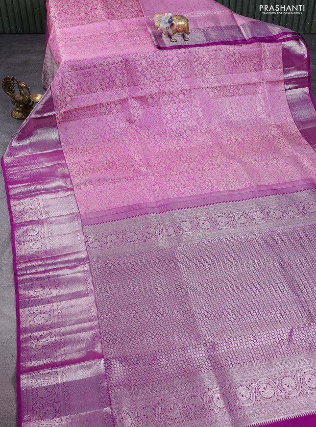 Pure kanchipuram silk saree lotus pink and purple with allover silver zari woven brocade weaves and silver zari woven border