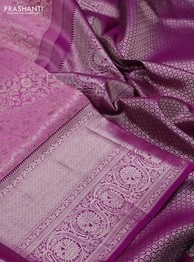 Pure kanchipuram silk saree lotus pink and purple with allover silver zari woven brocade weaves and silver zari woven border
