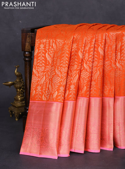Pure kanchipuram silk saree orange and light pink with allover zari woven brocade weaves and long rich zari woven border