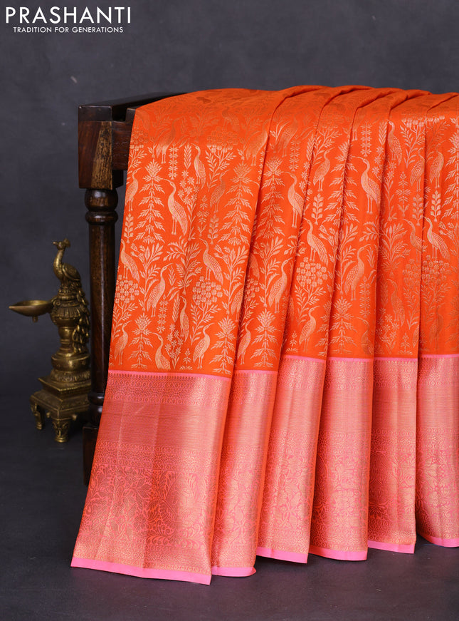 Pure kanchipuram silk saree orange and light pink with allover zari woven brocade weaves and long rich zari woven border
